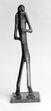 LS6105 Lucas SITHOLE "Penny whistler I." 1961 Wood covered in liquid steel 047x015x013 cm