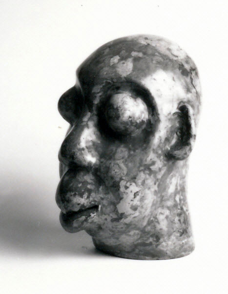 LS6907 Lucas SITHOLE "Head" 1969 Liquid steel 039x028x029 cm leftview