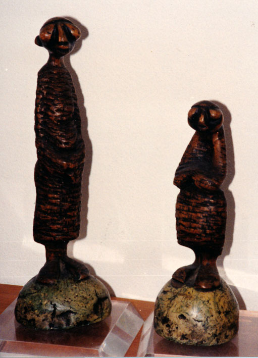 LS7429a_b Lucas SITHOLE "Gossip", 1974 - Swazi kiaat on liquid steel base (a pair) - meas. n/a