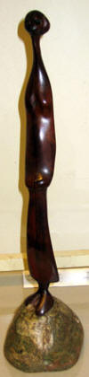 Lucas SITHOLE LS7551 "But why?", 1975 - wild olive wood on liquid steel base - 40cm H incl. base