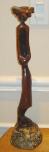 Lucas SITHOLE LS7638 "The housekeeper" ("Matlakala") 1976  Mahogany on liquid steel base  abt. 34cm H 