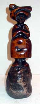 LS7934 Lucas SITHOLE "Noma Xhosa", 1979 - stinkwood on liquid steel base - 36x10x10 cm